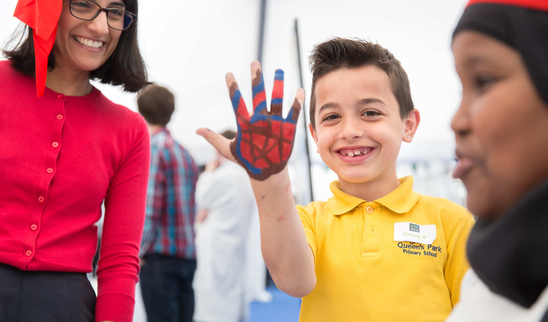 boy with painted hand