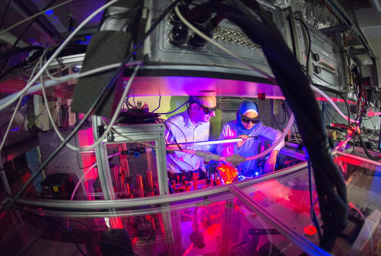 Jasper Van Thor, and PhD student Noura Zamzam working on the 'Spitfire' laser system to make femtosecond infrared measurements on photosynthesis