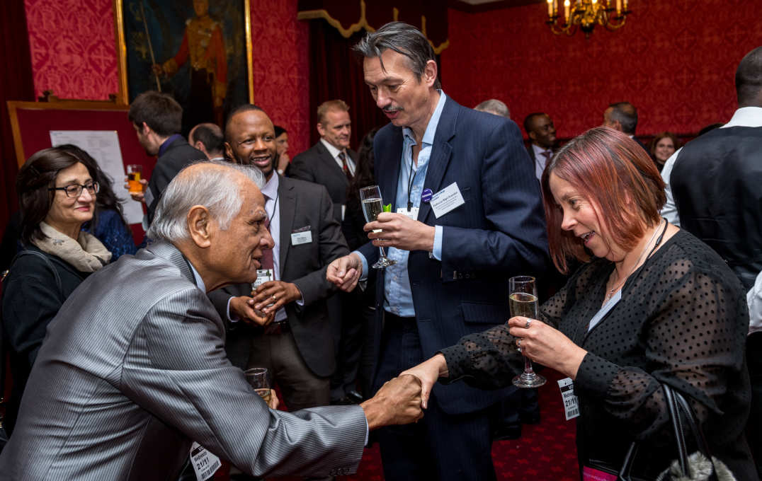 Alumni chat in the House of Lords