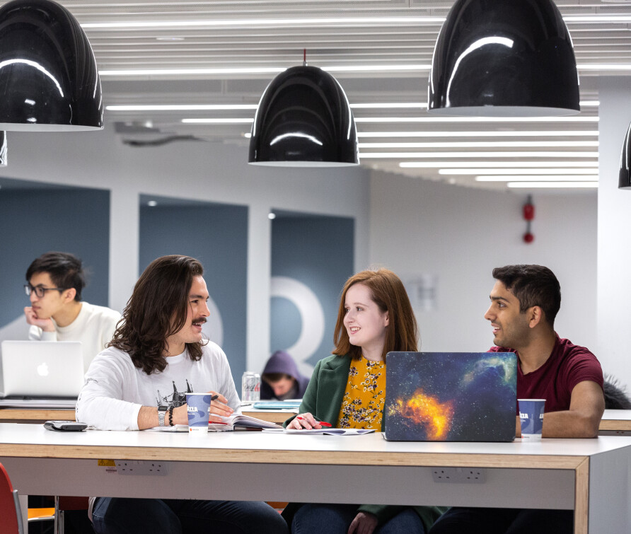 (Left to right) Undergraduate students and Imperial Outreach student mentors Jack Window, Holly Monkhouse and Harshil Joshi in the boss space. Shot for the widening participation spread in the Prospectus.