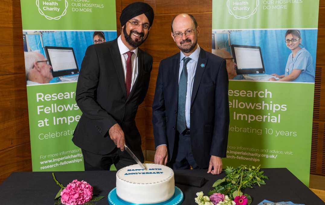 Professor Waljit Dhillo and Mr Ian Lush, Chief Executive of Imperial Health Charity, cut a special cake to mark the 10th anniversary of the Imperial Research Fellowships programme