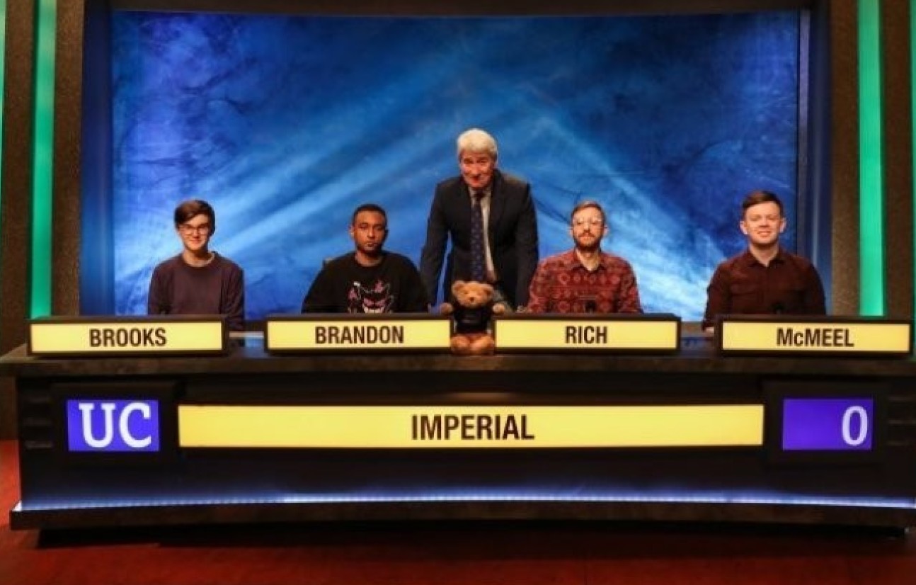 Photo of University Challenge's Imperial team with host Jeremy Paxman