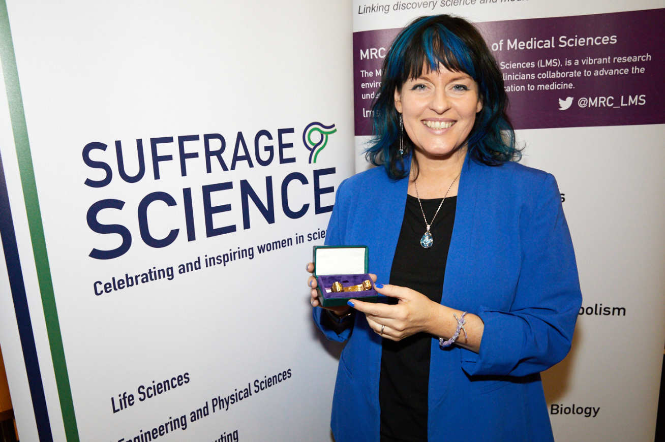 Professor Julie McCann with her award