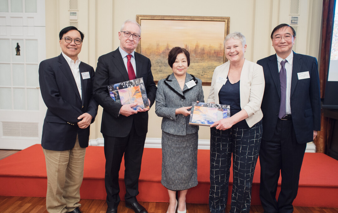 President Professor Hugh Brady stands alongside alumni in Hong Kong 