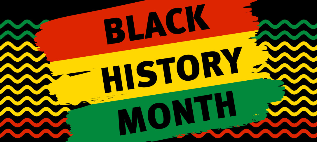 Paint strokes of the colours red, yellow and green with the text 'Black History Month' in black overlayed