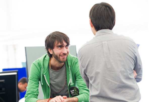 Picture of two lab members talking