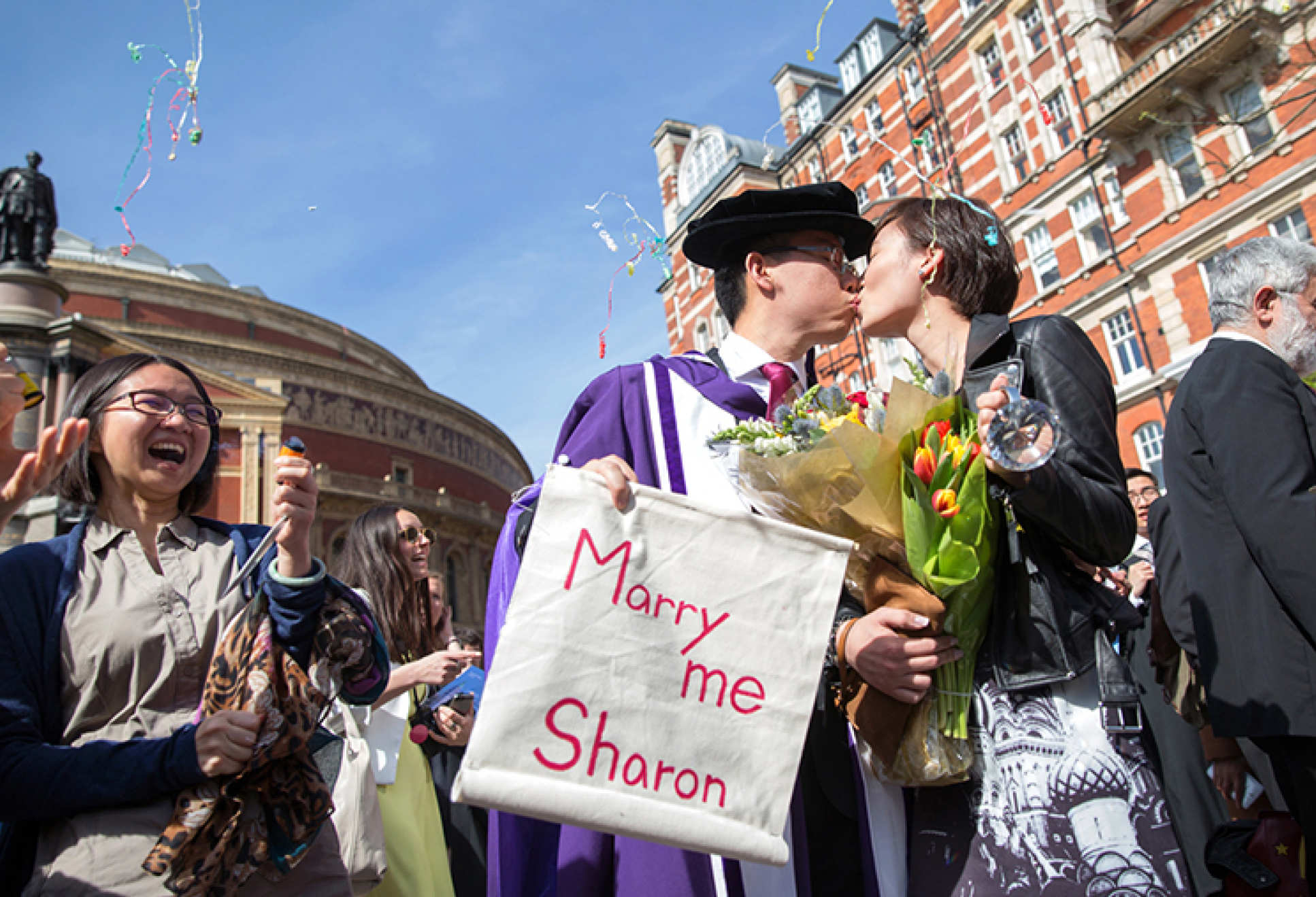 Student proposing to his girlfriend on Commemoration day