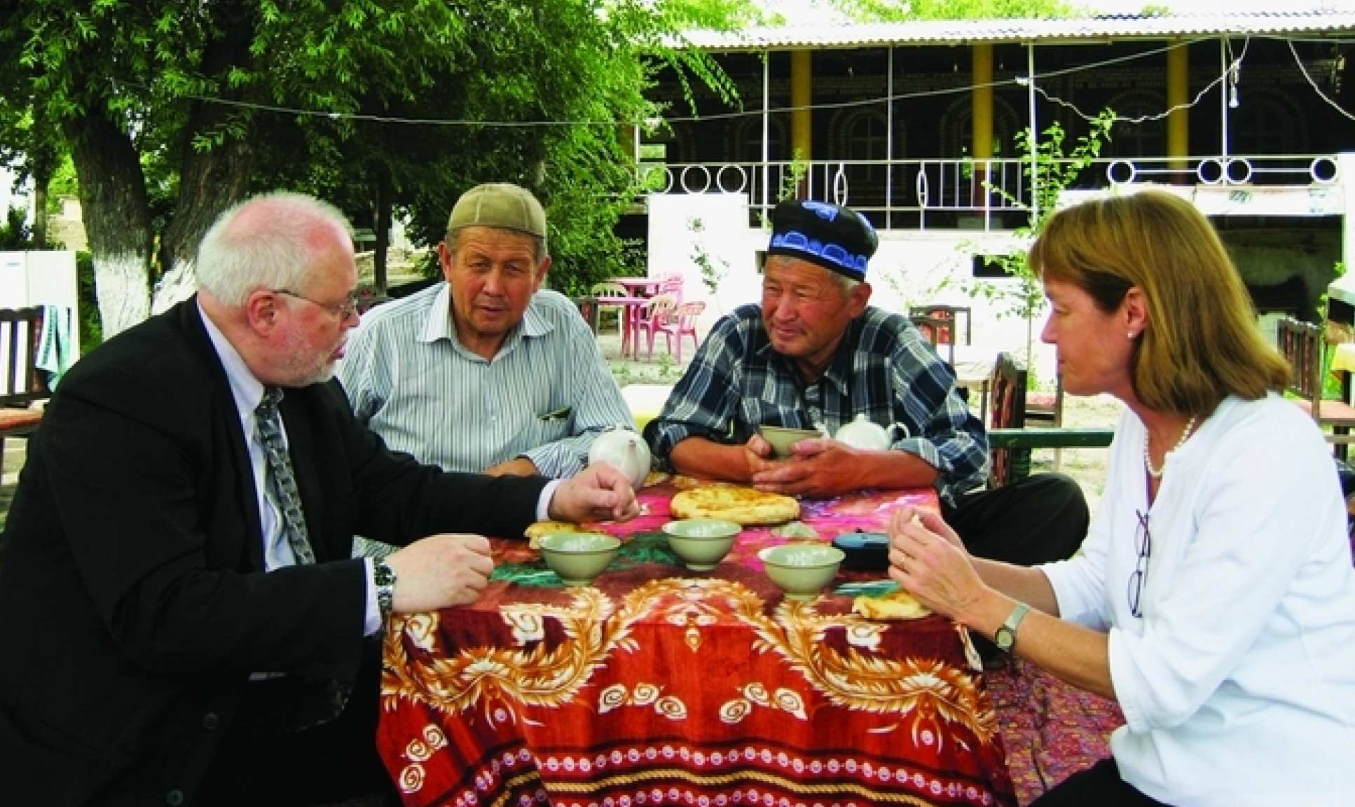 Alice Gast having tea in Uzbekistan as US Science Envoy