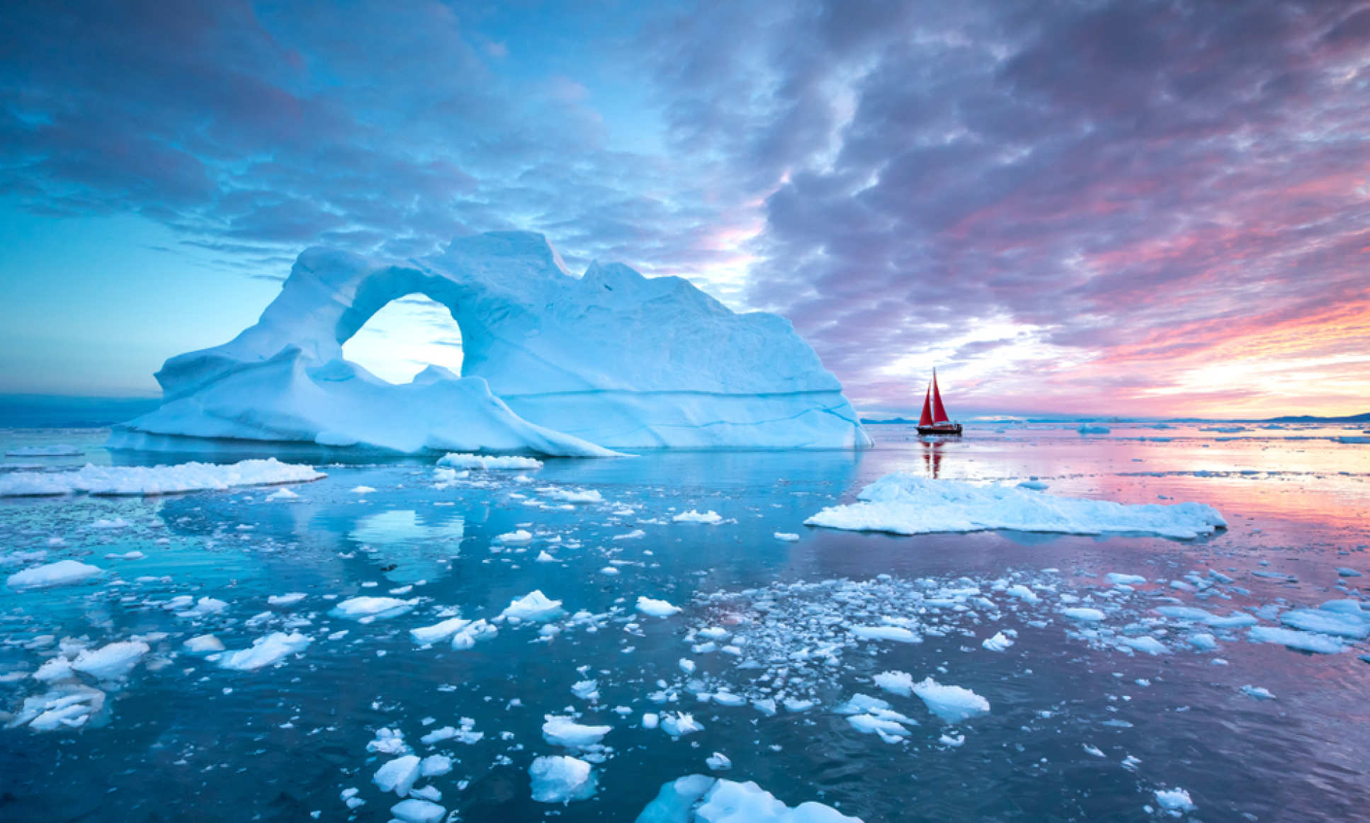 A sail boat on the arctic waters
