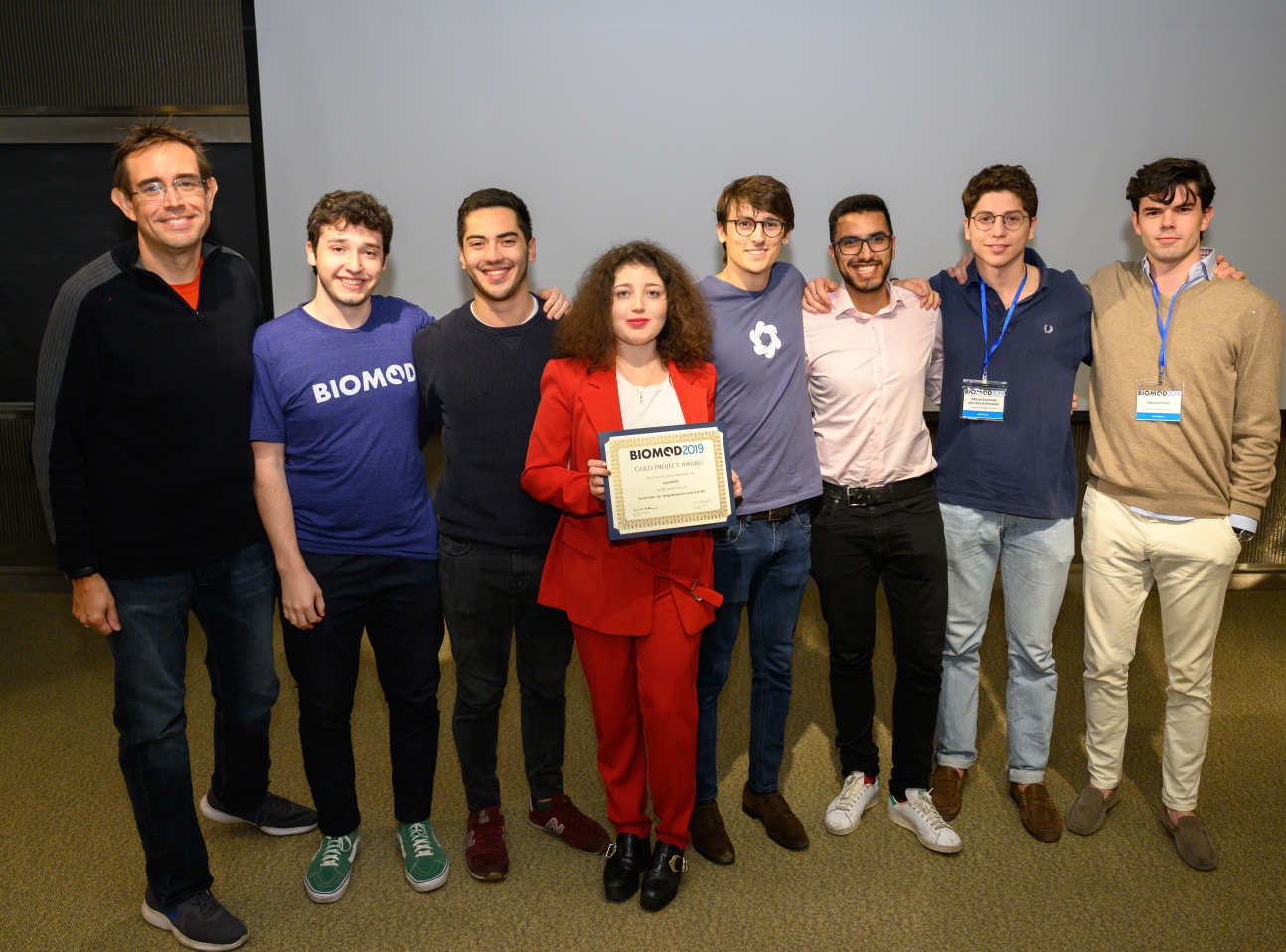 Student awardees hold their certificate