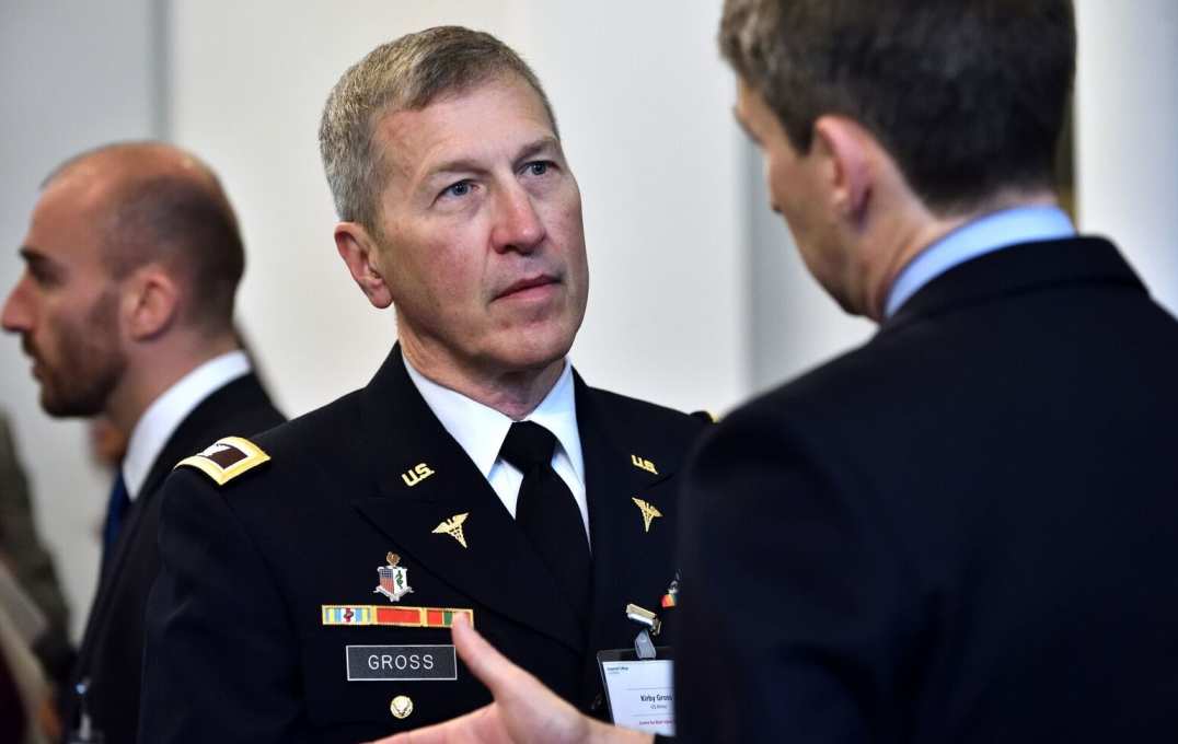 Guests like US Army surgeon Kirby Gross mingled and networked during the conference