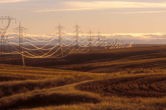 Electric power lines across fields