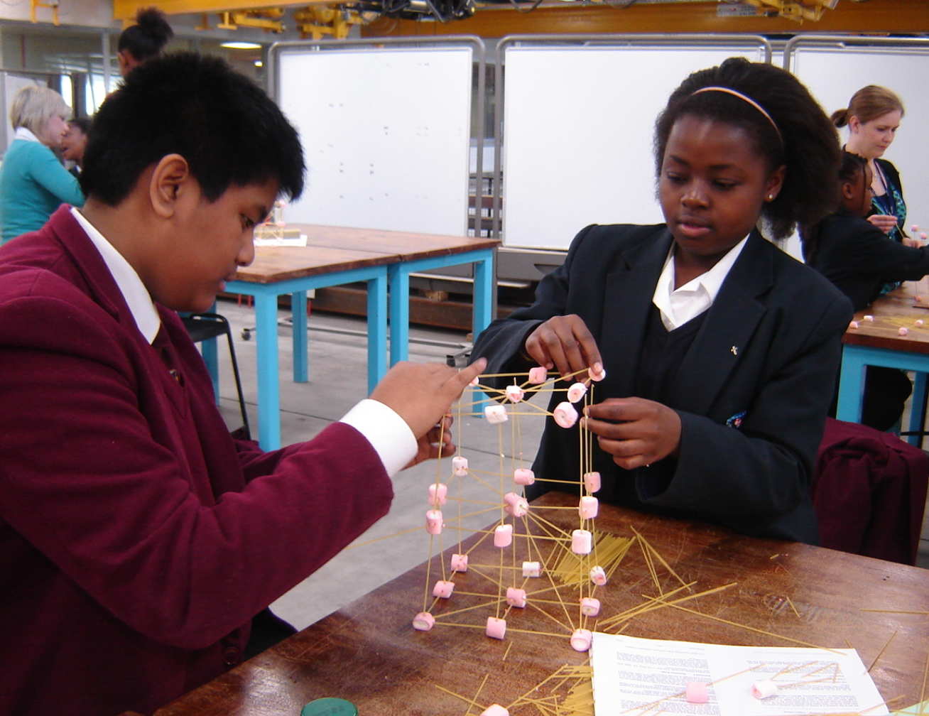 Students build bridges using spaghetti at Creative Futures workshop