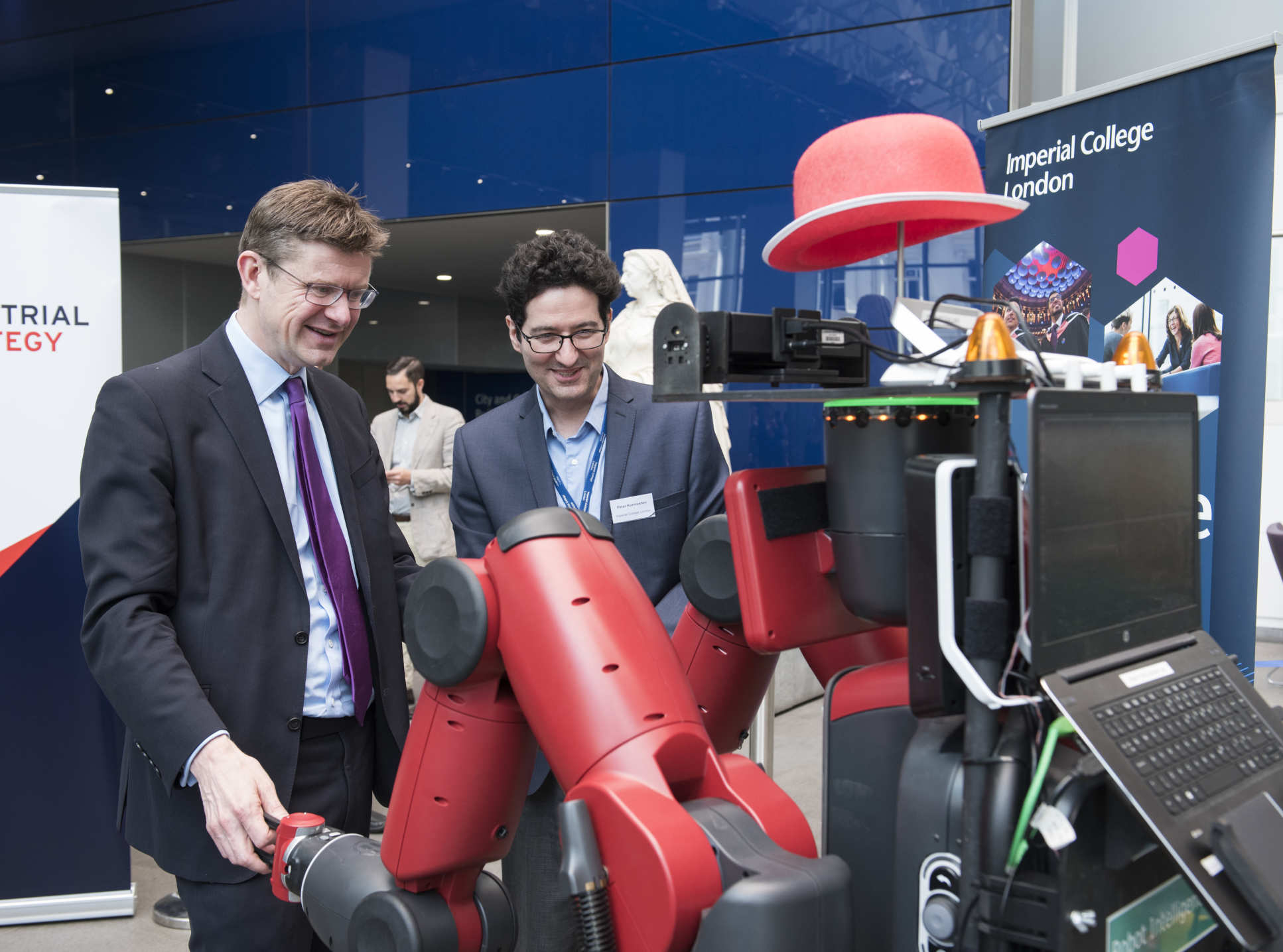 BEIS Secretary Greg Clark dances with ROBOT DE NIRO at the AI Sector Deal launch hosted by Imperial in April