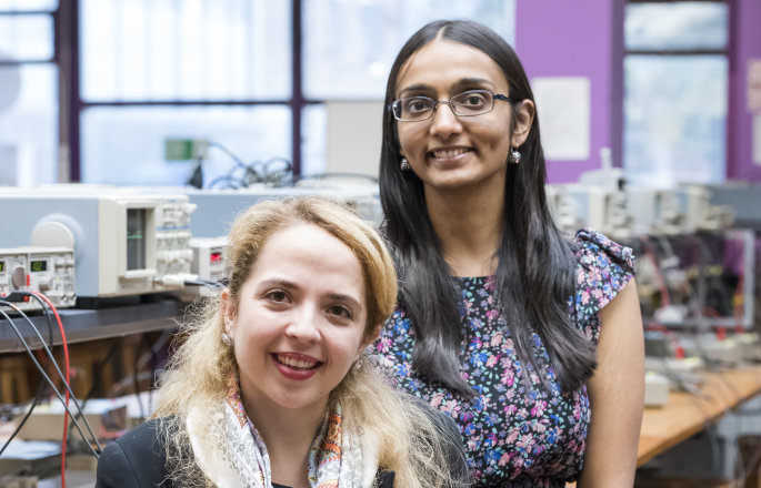 2 successful Imperial alumni sat in their working environment