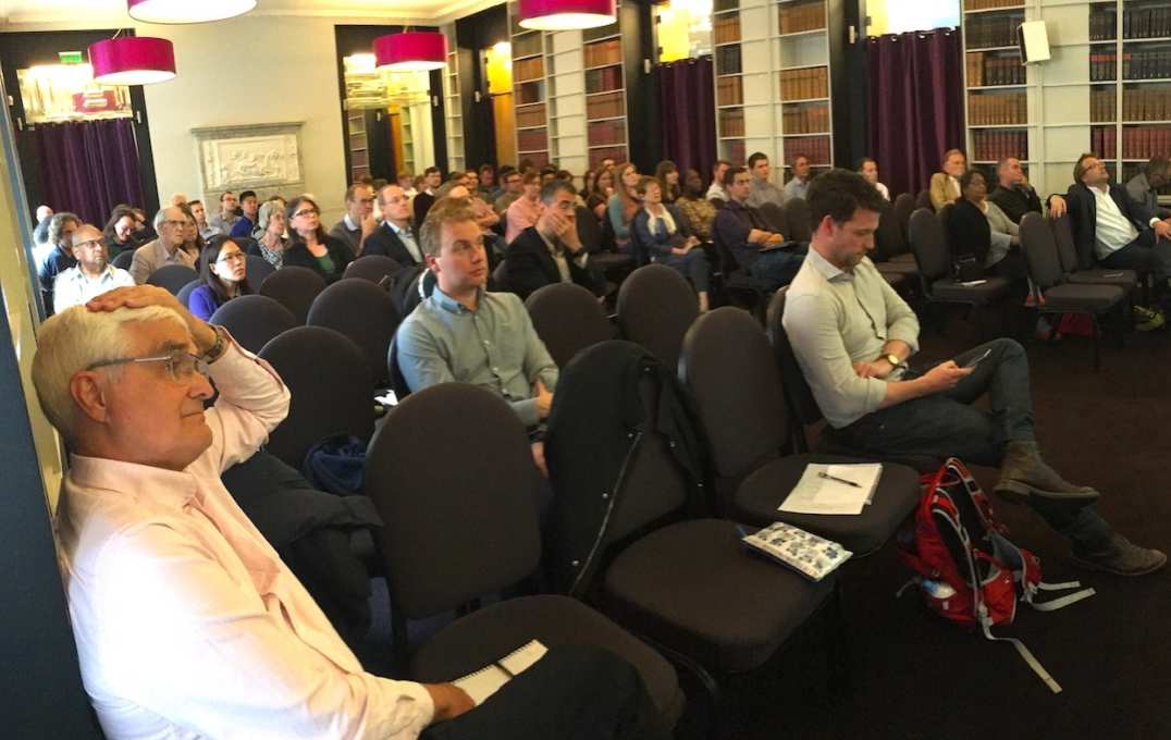 A wide angle shot of the attendees, including Prof Bob Sinden looking on