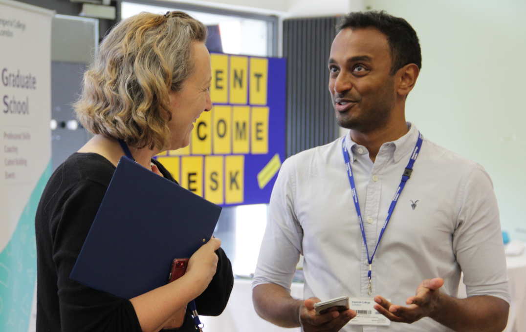 man talking to woman