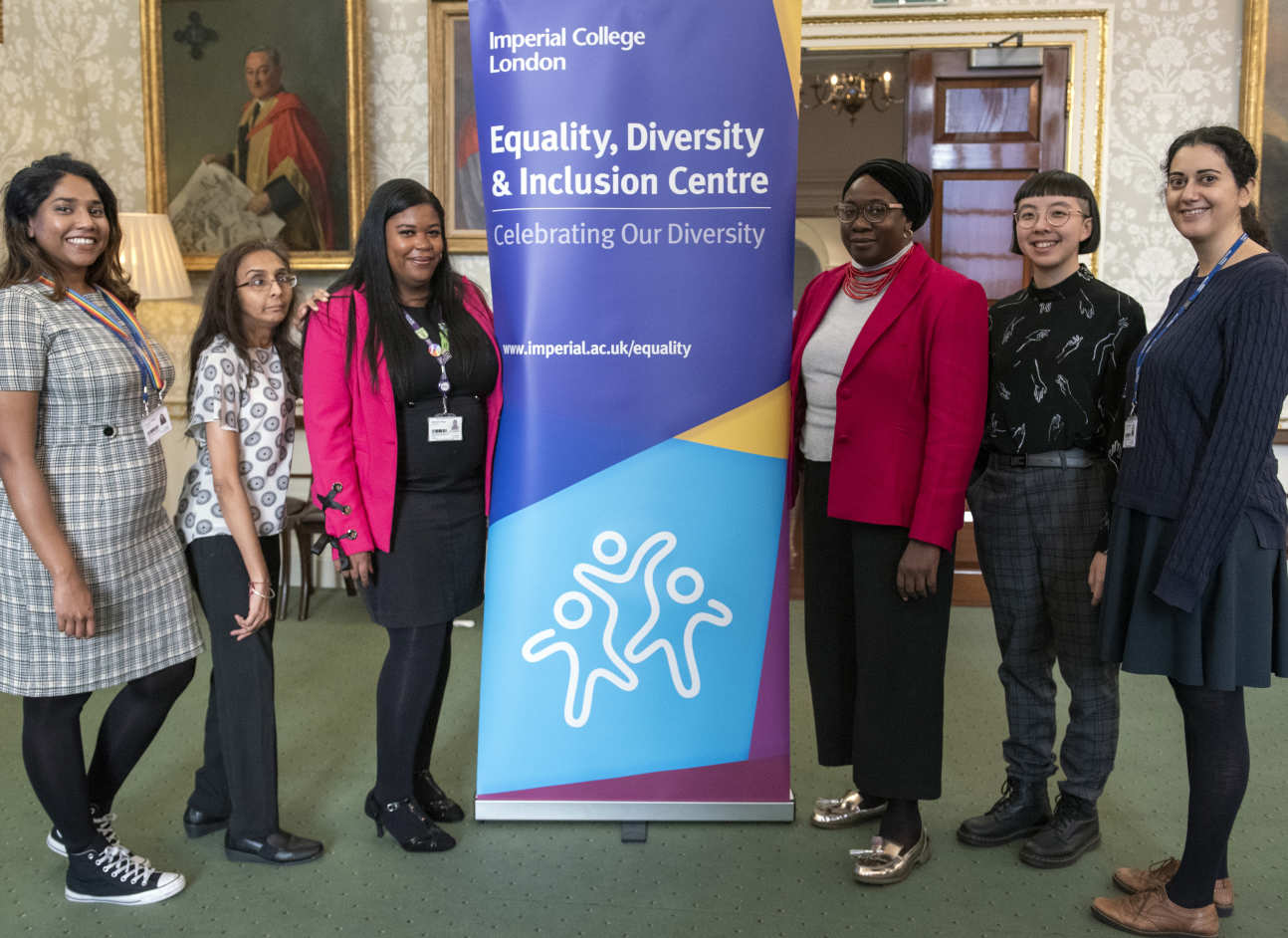 Participants at IMPACT reunion with Equality, Diversity and Inclusion Centre banner