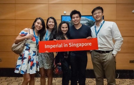 Three girls and two boys at an alumni event in Singapore