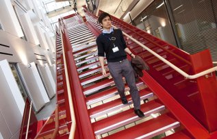Student walking down stairs