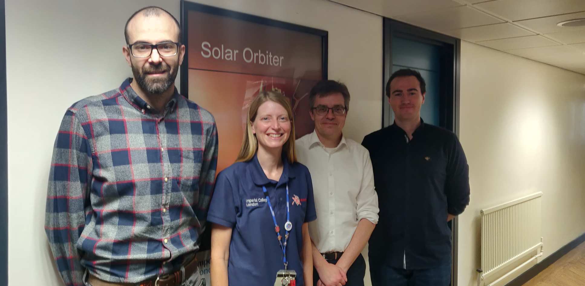 People in front of a Solar orbiter poster
