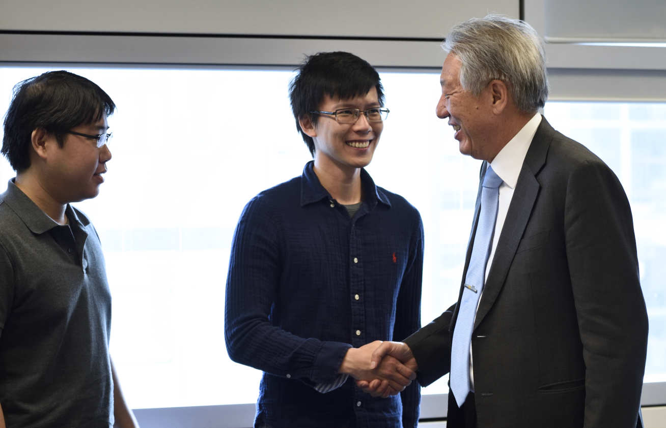 Mr Teo discuss synthetic biology with students Sean Lee and Garret Wong
