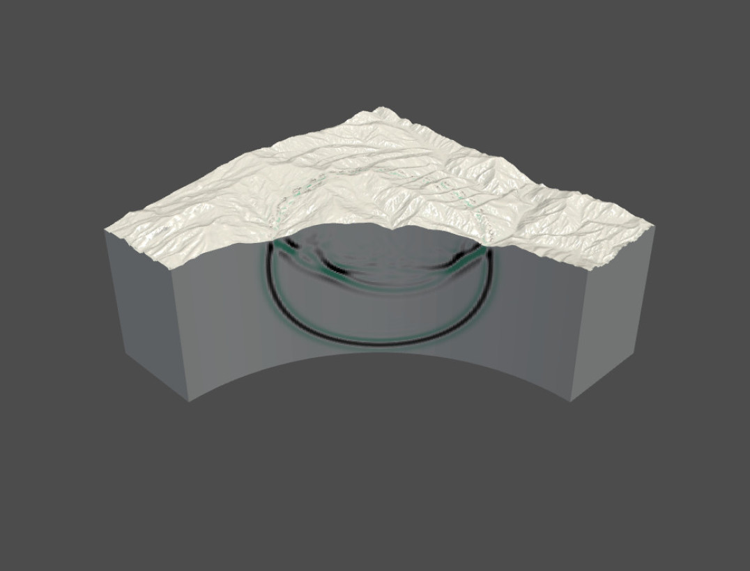 A cutaway of a seismic wave interacting with mountainous topography implemented as an immersed boundary.