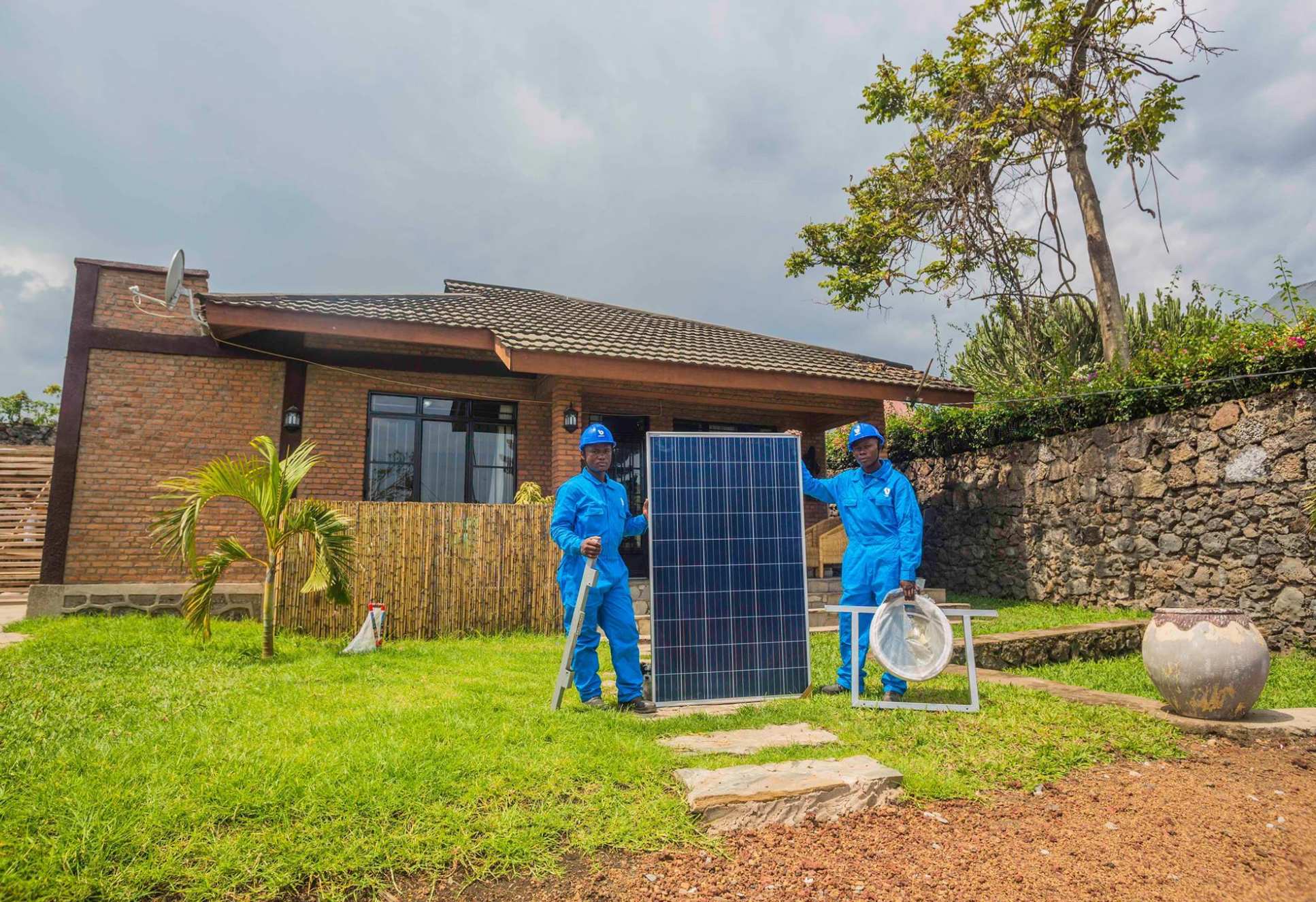 Workers with a solar panel