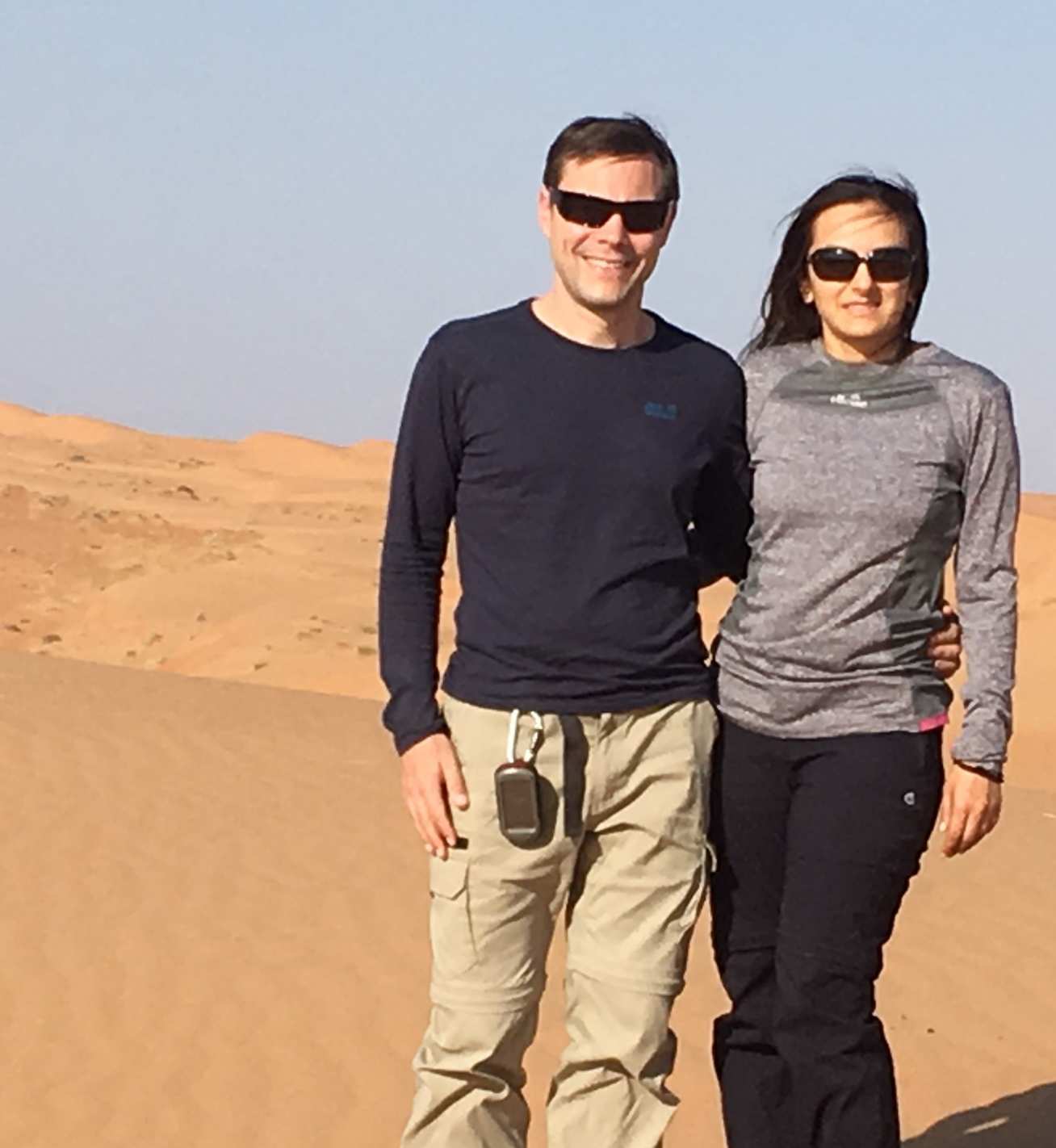 Photo of Dr John with co-author Saira Khan in the Wahiba Sands region of Oman.