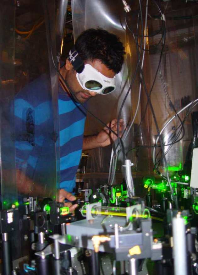 The tale of the round electron: a scientist at work in the lab using lasers