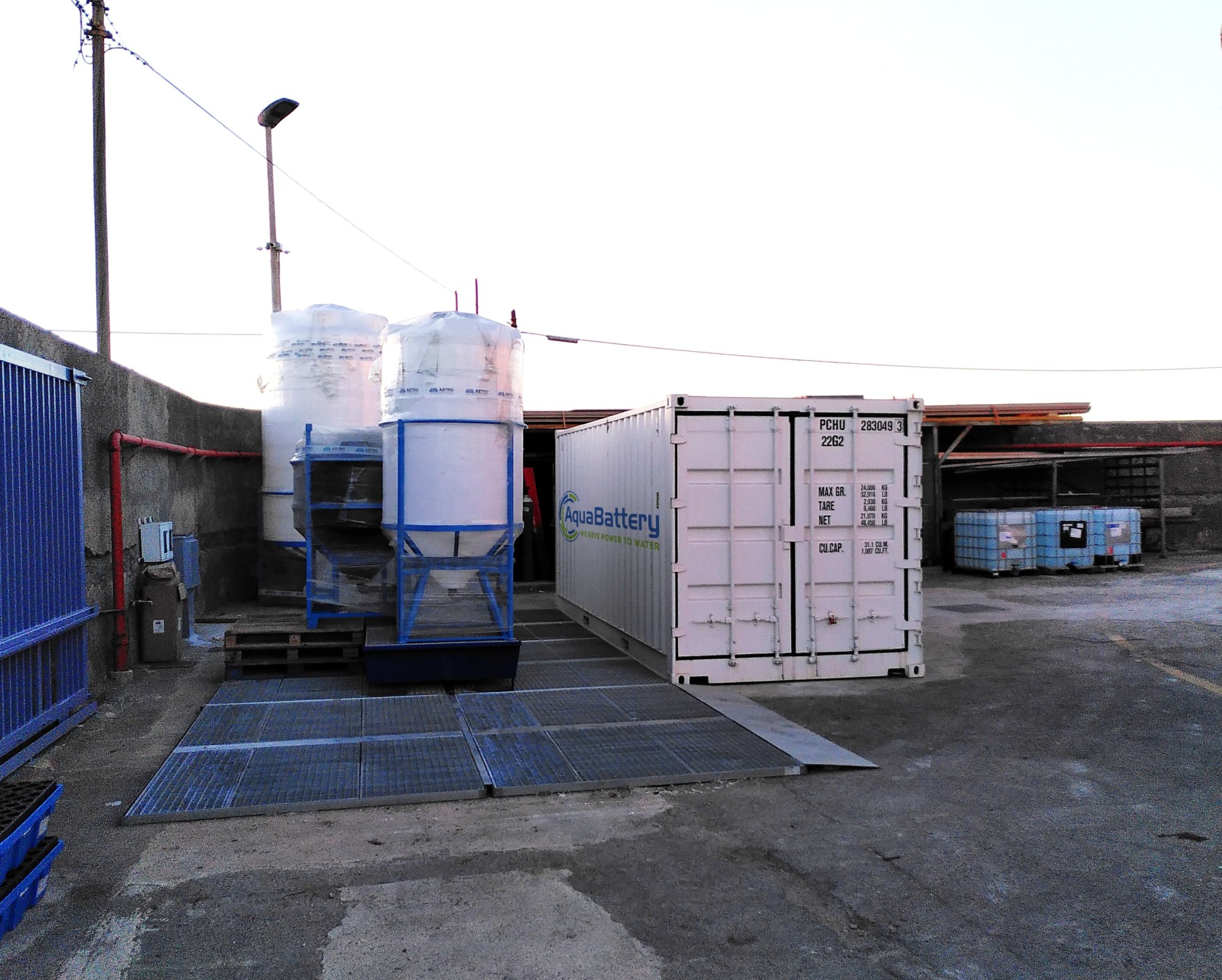 A shipping container and water tank