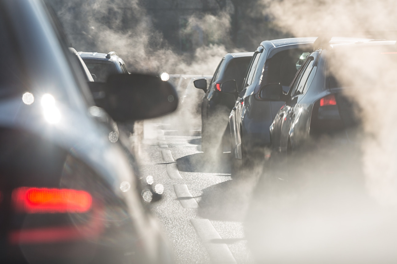 Smokey emissions in a car traffic queue