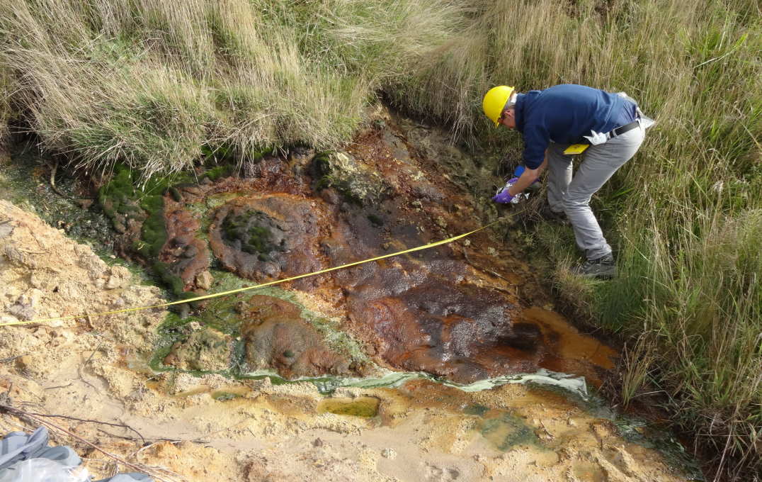 Photo of researchers measuring the stream