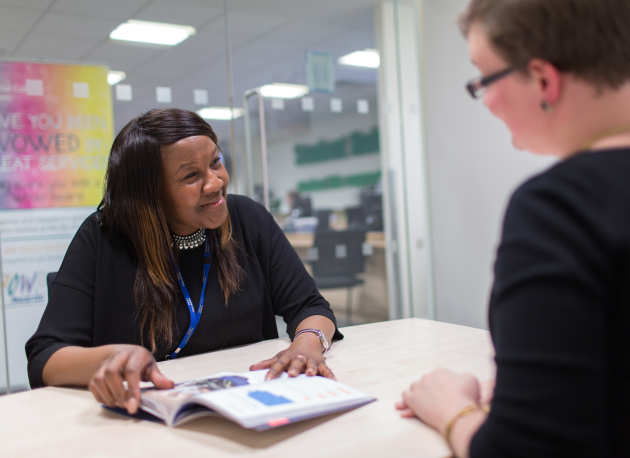 Staff member with a student