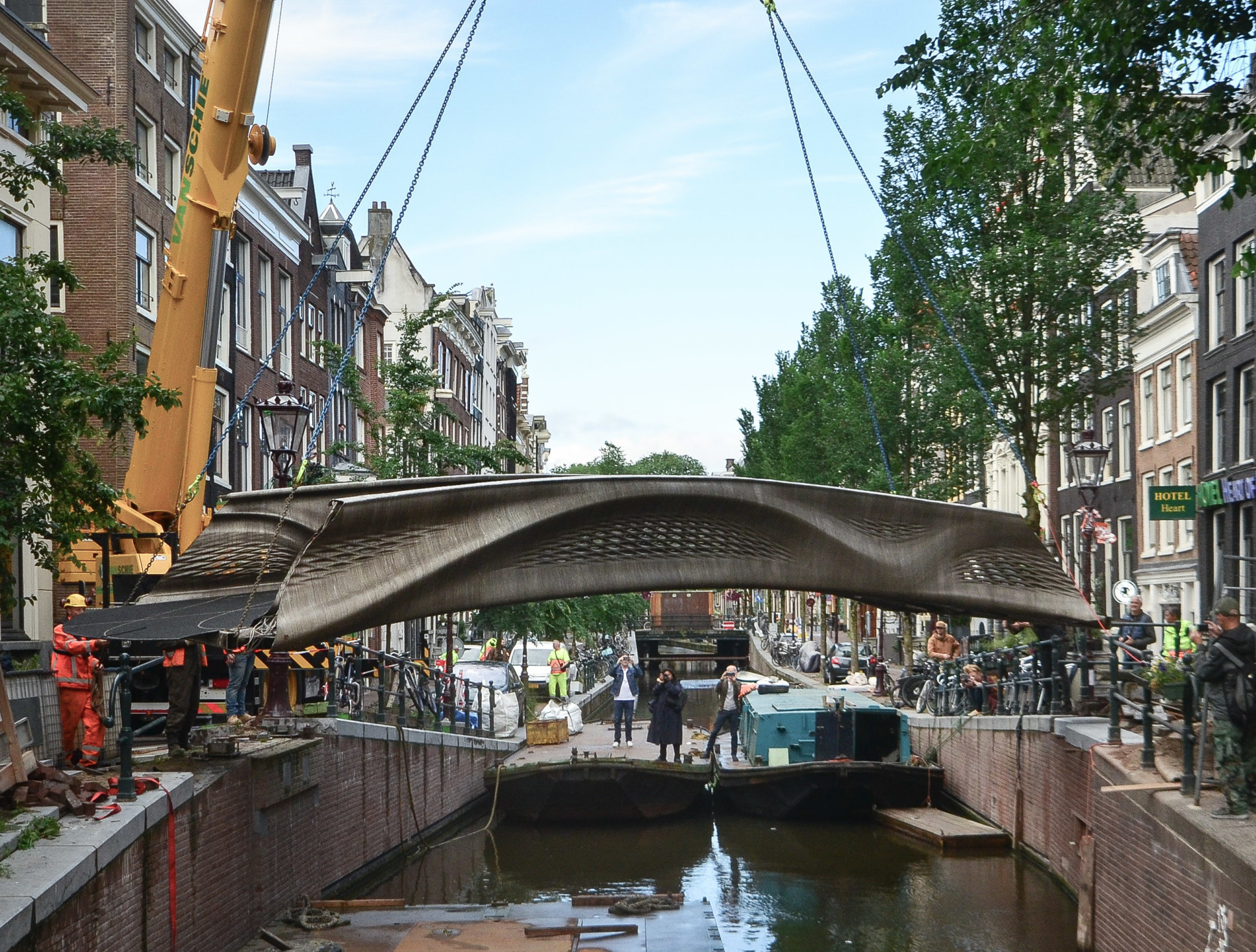 Bridge being lowered across canal