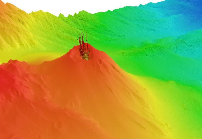 Colour-coded image of the volcano indicating metres below sea level, with tendrils of gas coming from the top