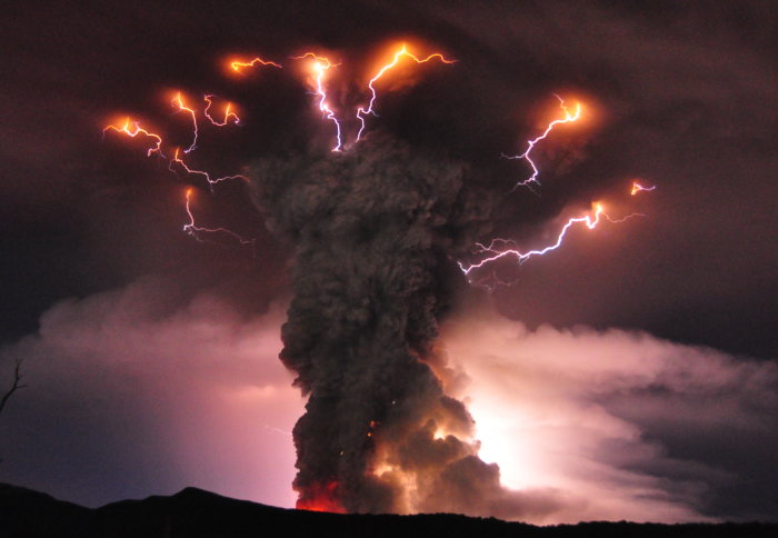 A volcanic eruption with lightning in the ash cloud