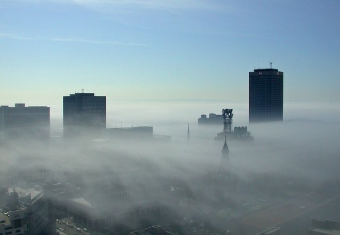 Mist and pollution over a cityscape