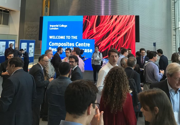 Imperial researchers and academics meeting representatives from industry in the main college entrance