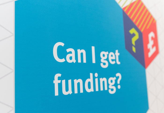 A poster asking about funding