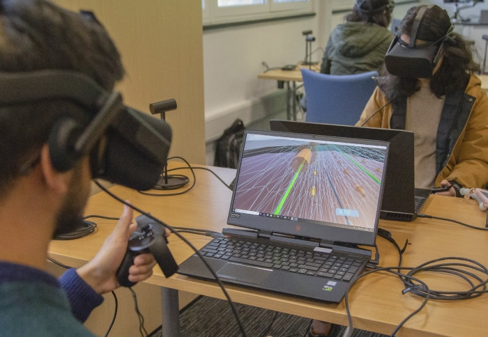 A student demonstrates the virtual reality software
