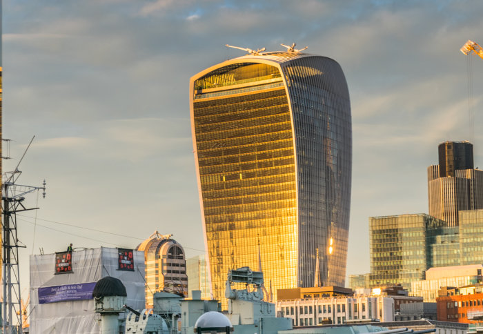 Photo of 20 Fenchurch Street with sun shining on its concave façade