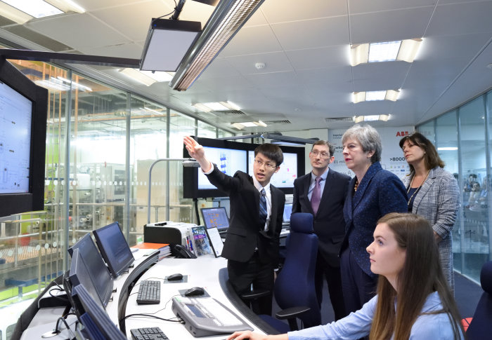 Prime Minister Theresa May and Energy Minister Claire Perry with Dr Colin Hale and students