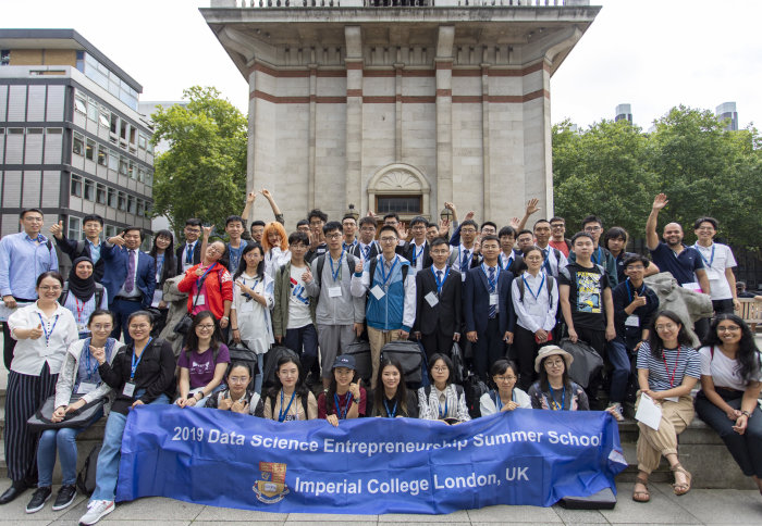 Group photo of students attending the Data Science Entrepreneurship Summer School 2019 in front of the Queen Tower