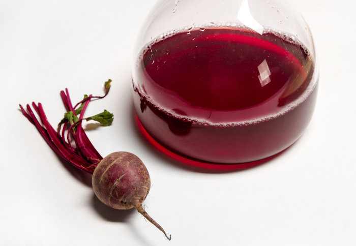 A beetroot and its juice