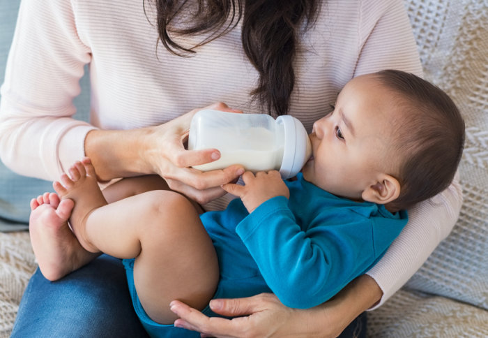 A baby drinking a bottle