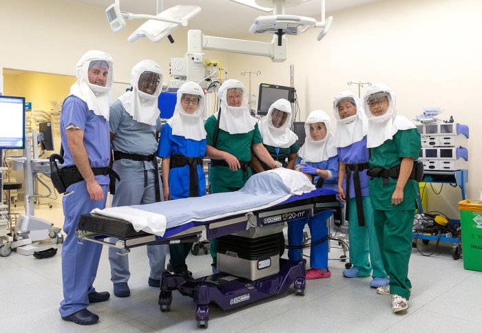 Surgeons wearing equipment