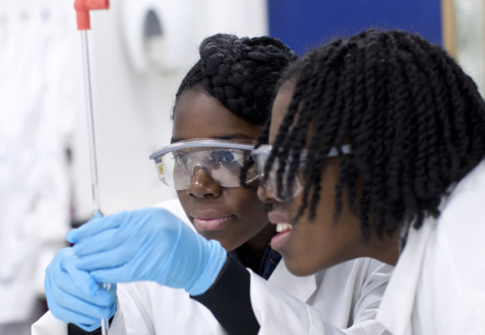 Two STEMM students working in a lab