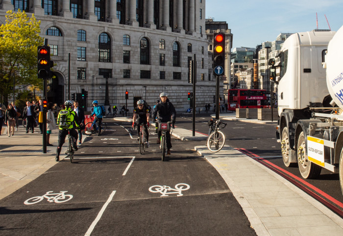 Cyclists using a bike lane in London
