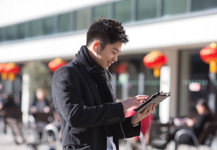 Image of a student using an iPad